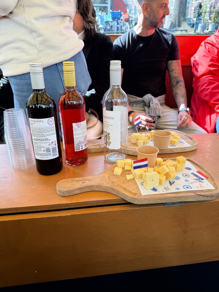 Cheese and wine served on a canal cruise in Amsterdam. 