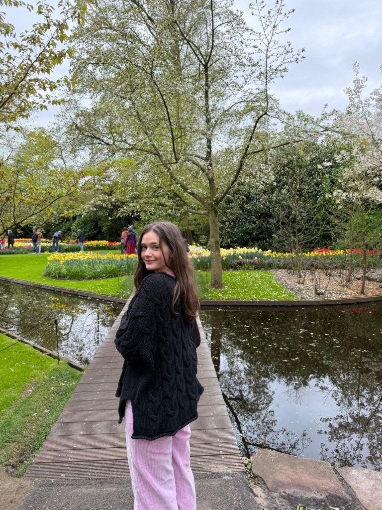 Walking over a bridge at Keukenhof Gardens. 